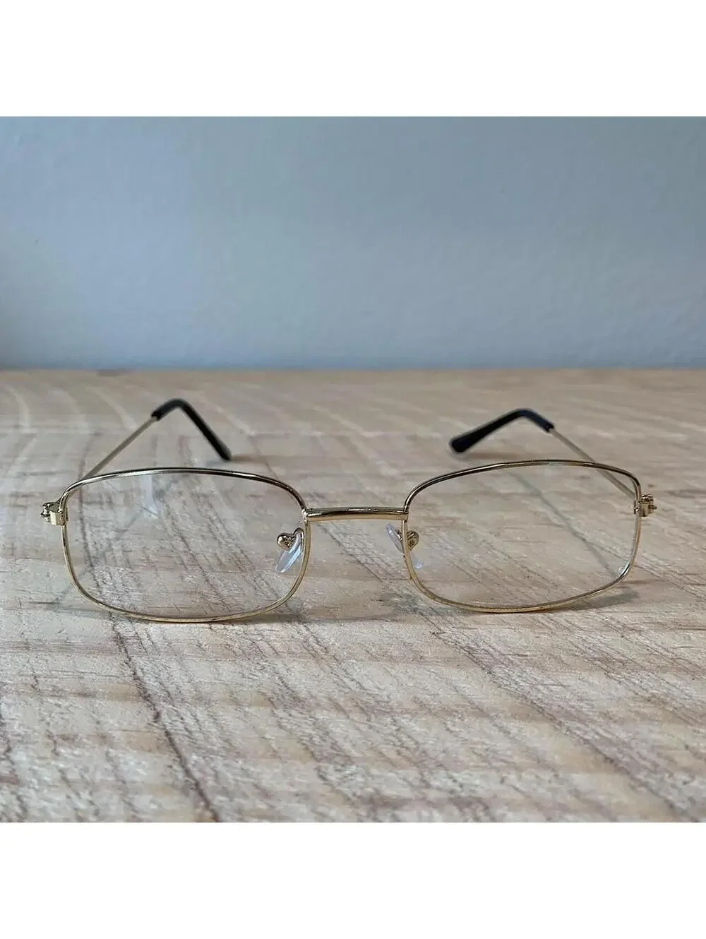 Y2k 90s 2000s vintage unique slim style lense sunglasses. gold trim with clear